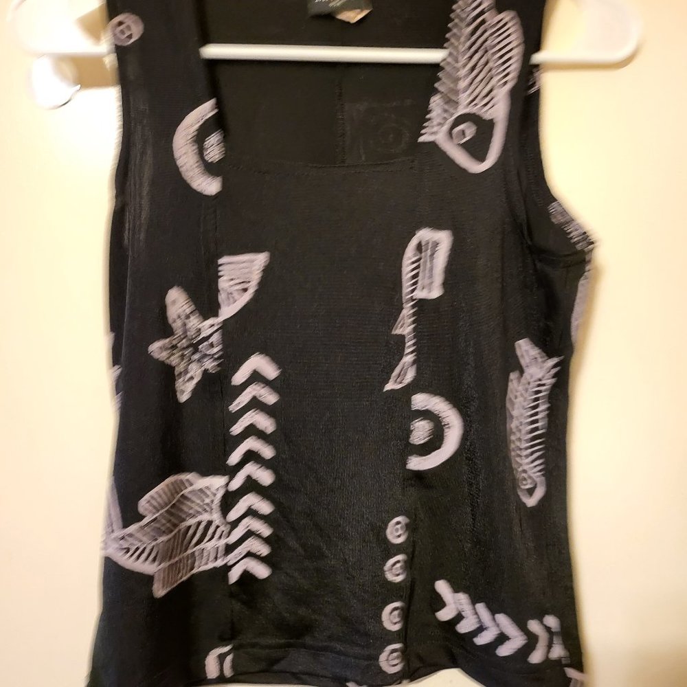THE ATTIC TOP